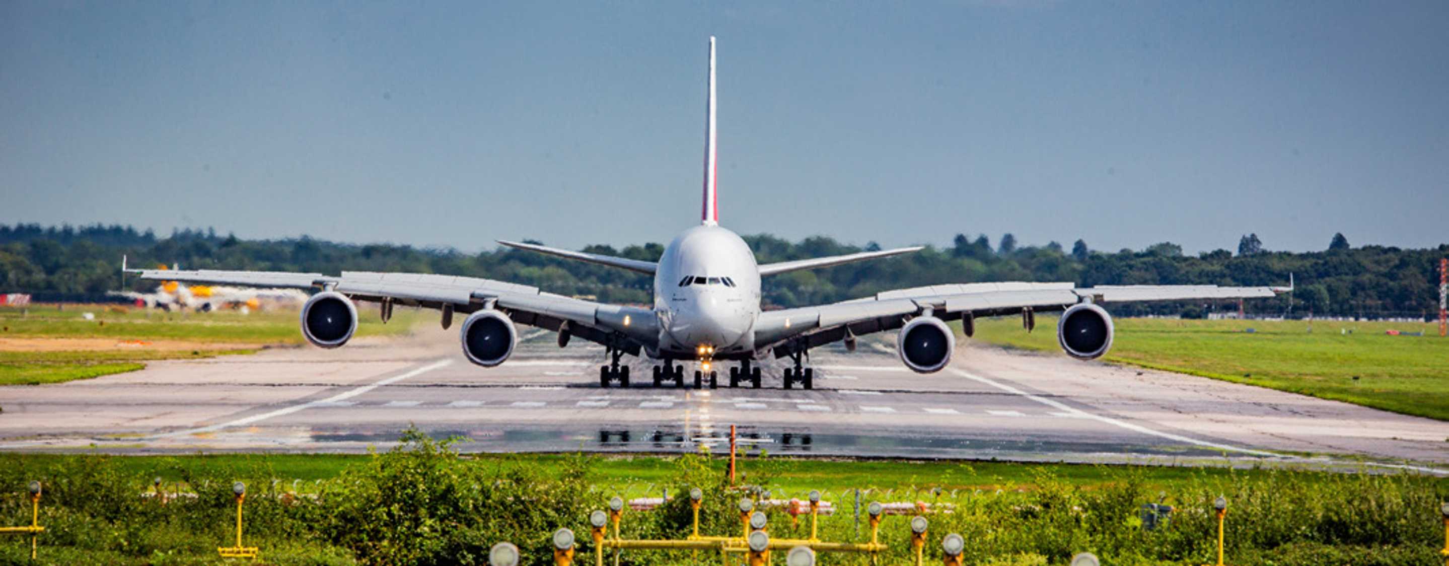 An image of an airplane on an airport runway