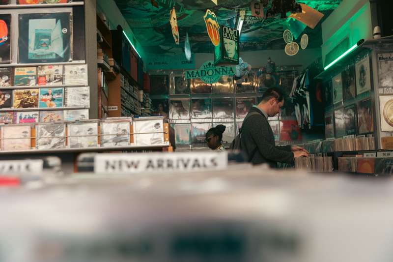 Student browsing in a record shop