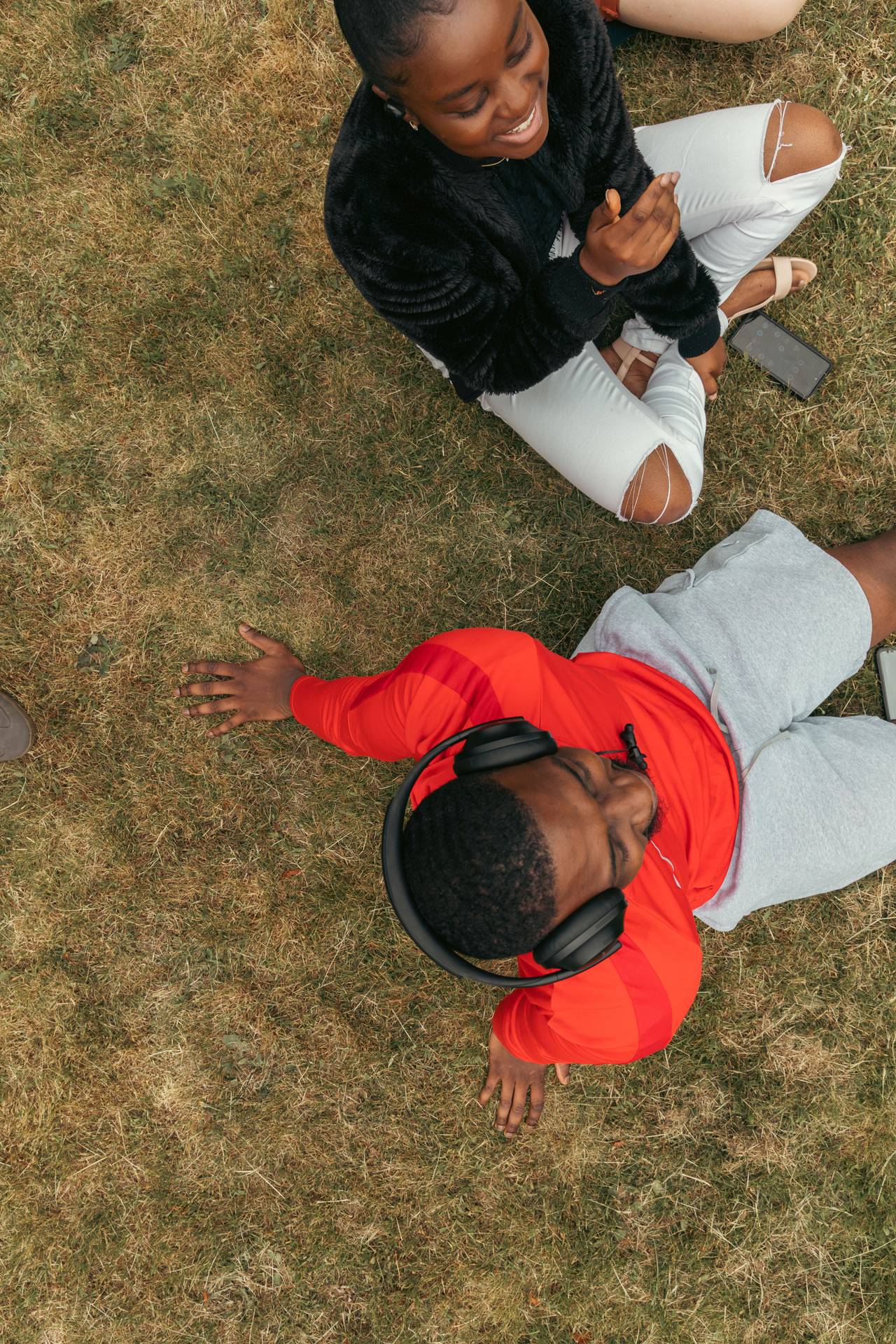 Overhead view of students sitting in a park
