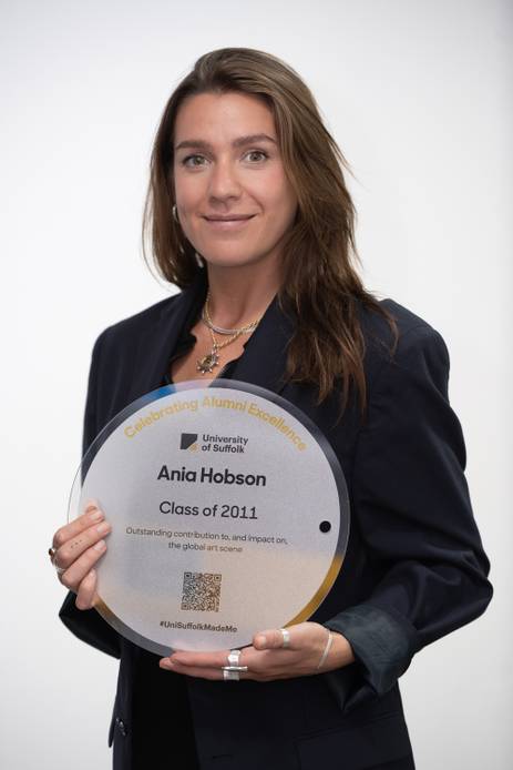 Ania Hobson, Suffolk Salutes winner, holding an award for outstanding contribution