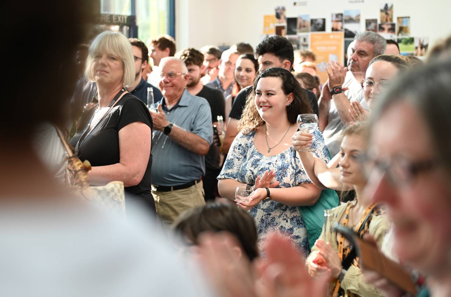 Gathering of students and guests at the Arts Degree Show