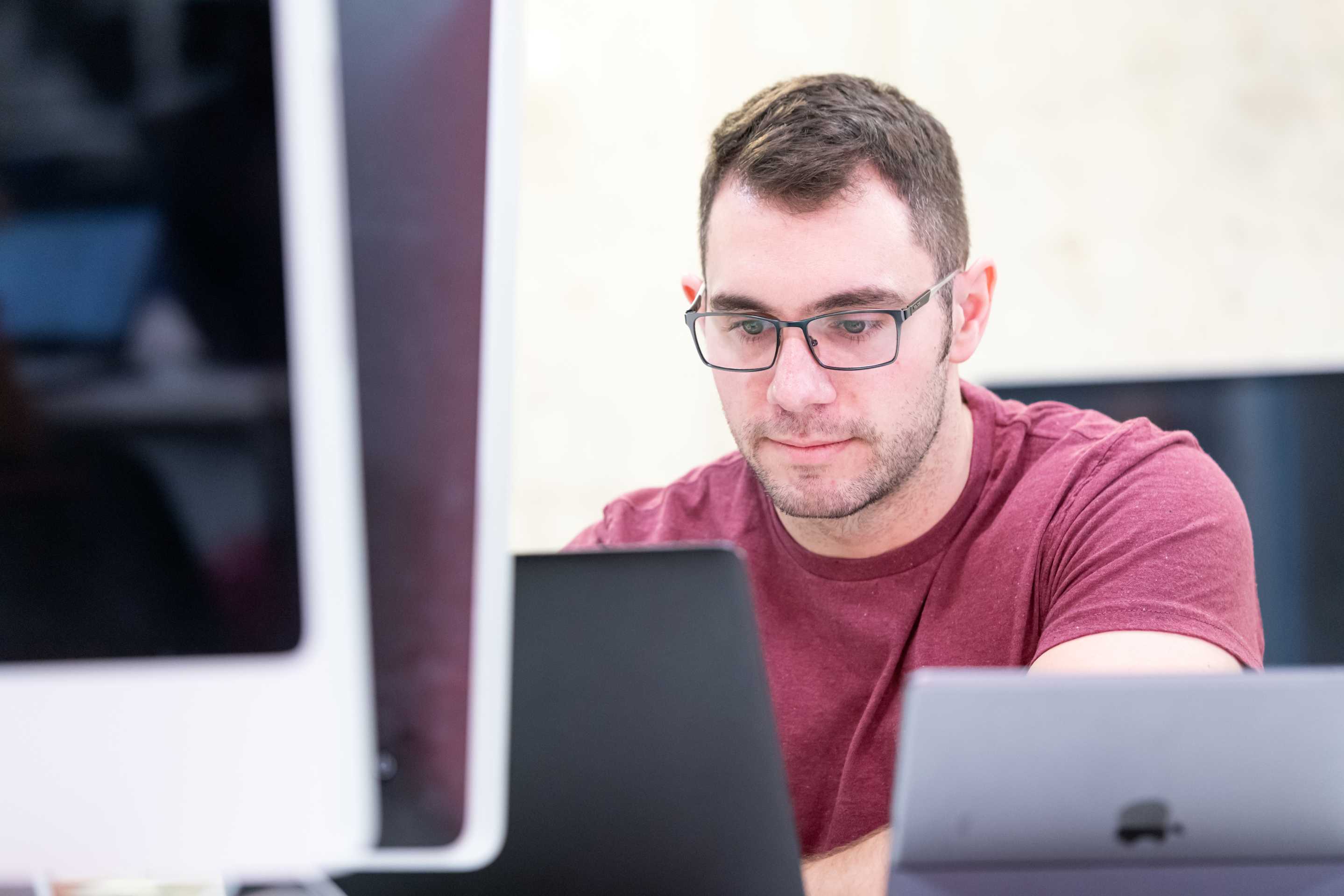 Close-up of a student sitting at a computer