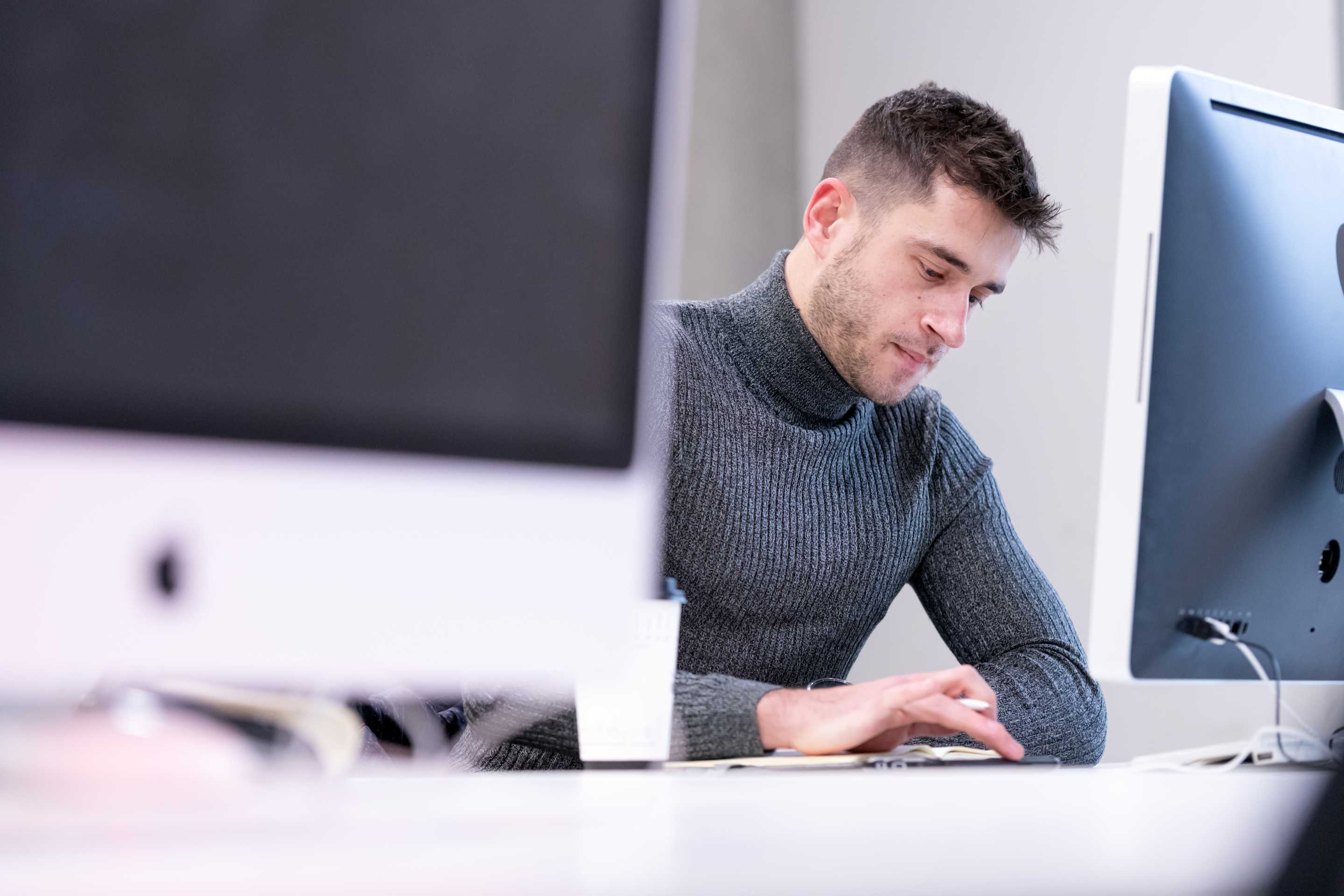 Close-up of a student sitting at a computer