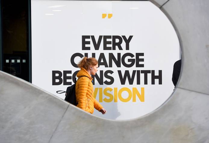 A student walking on campus