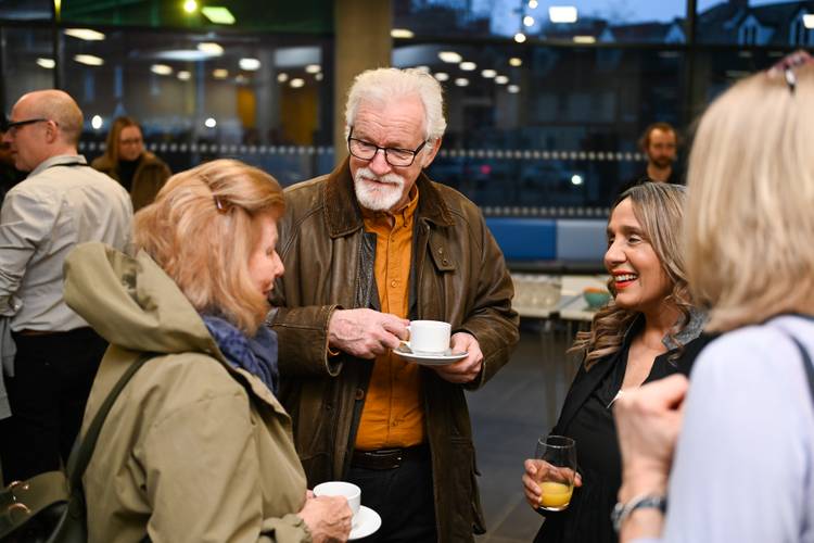 Group of people gathered in foyer