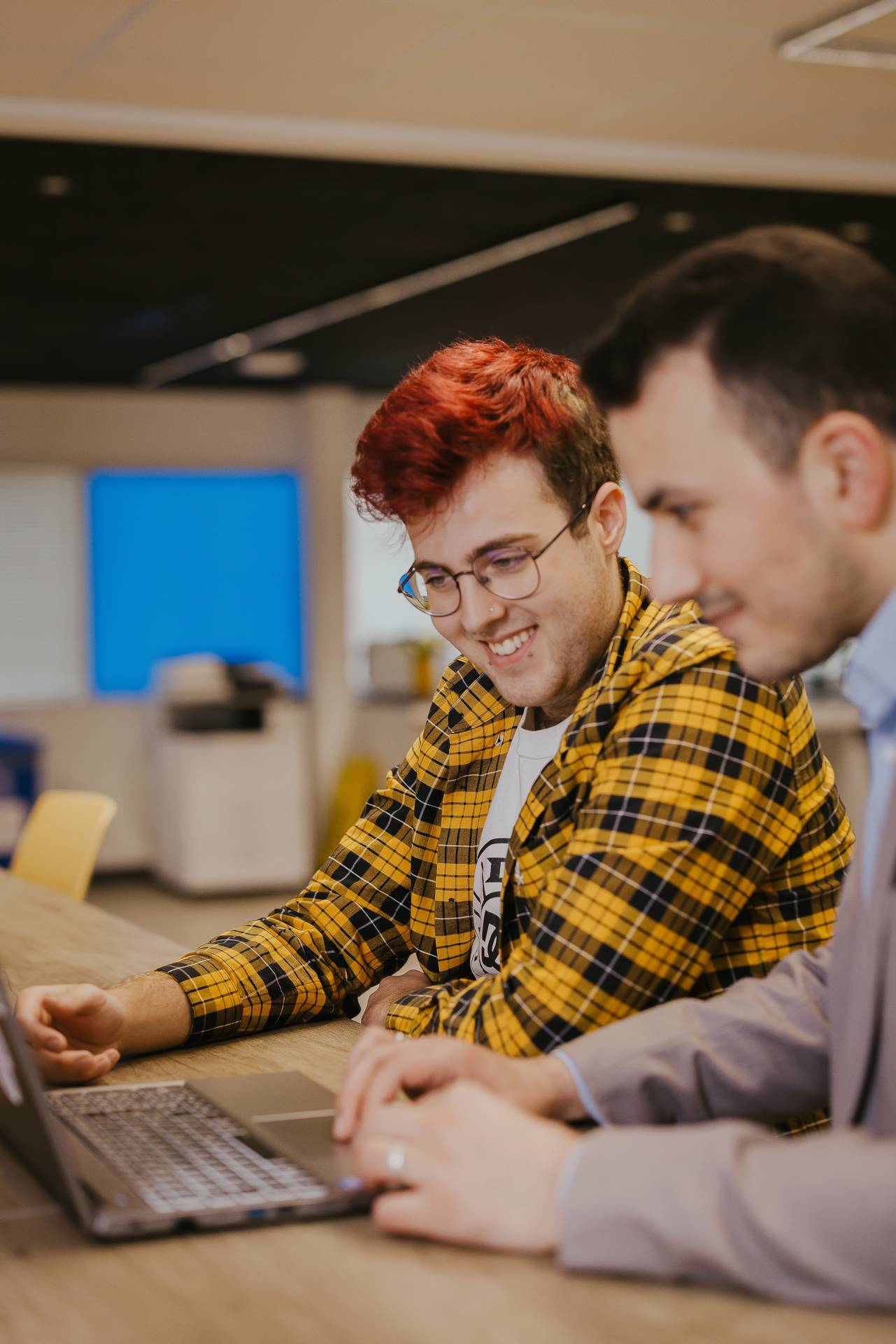 Two students sat at a table