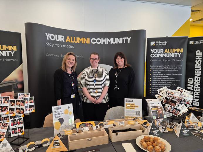 staff group at information stand