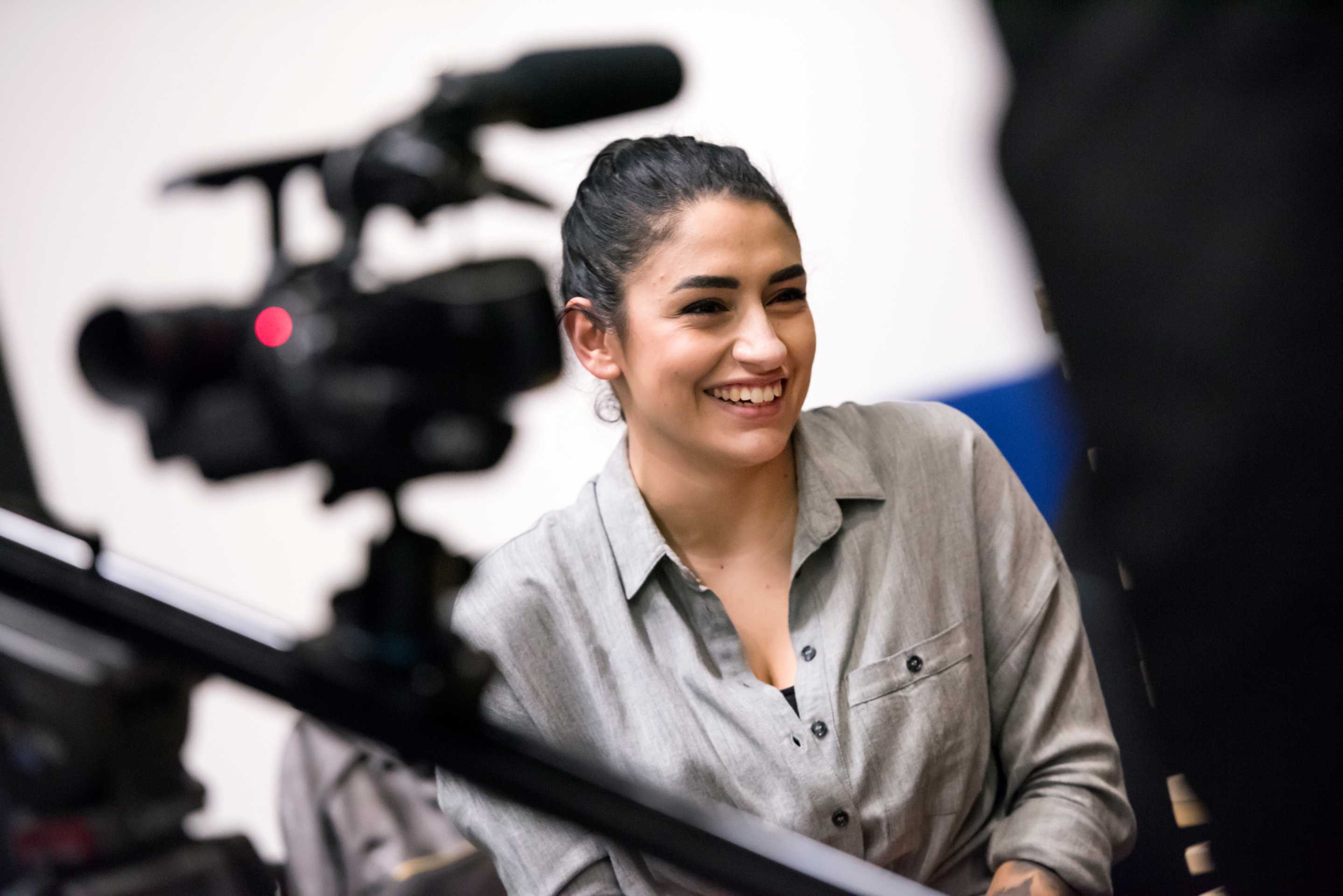 Close-up of a student being filmed