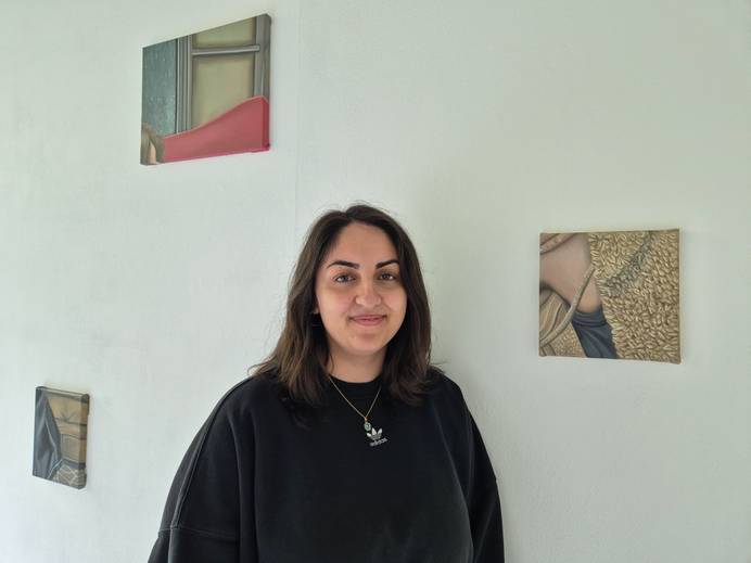 student with artwork