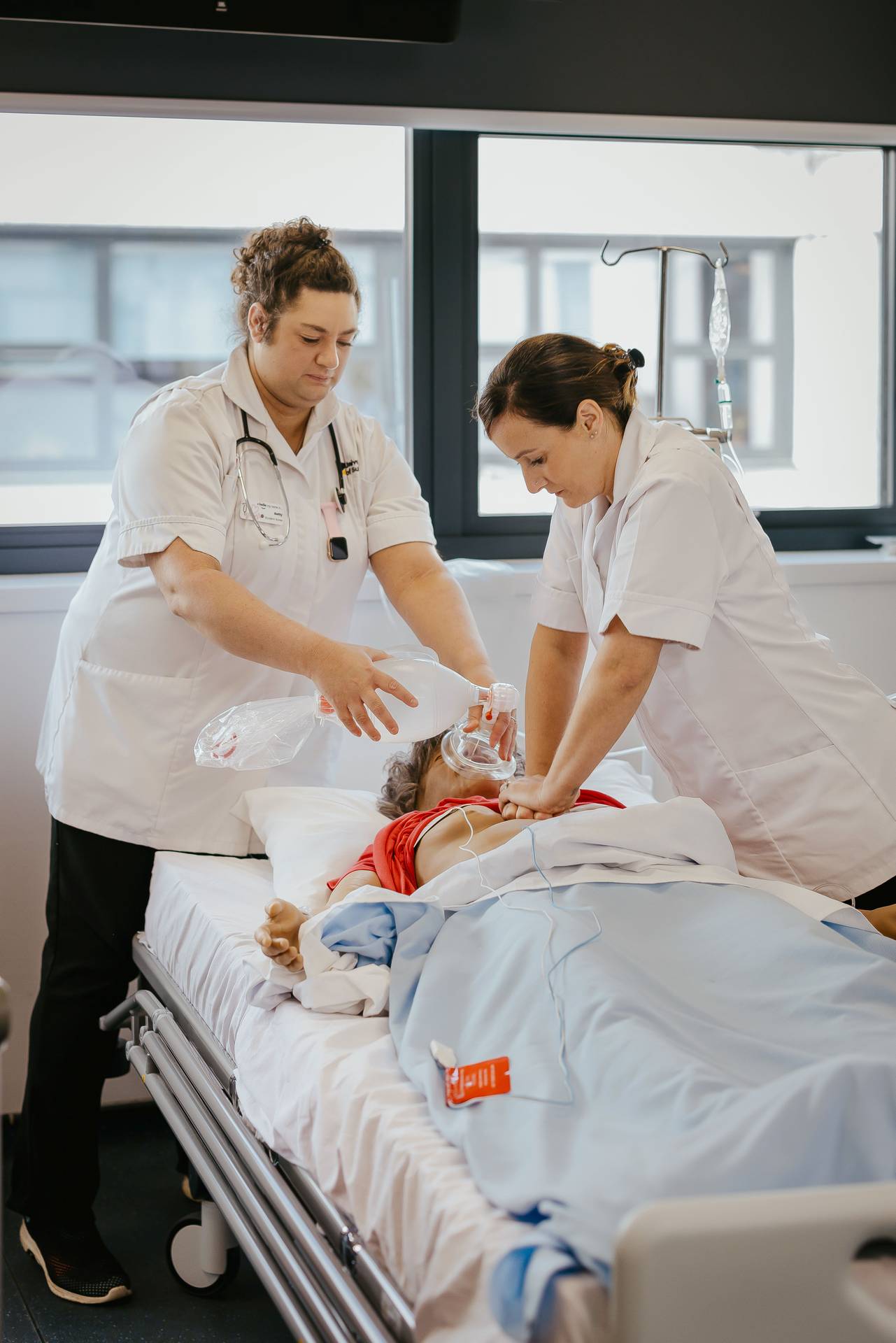Students working on simulated patient