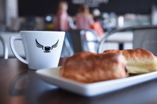 Close-up of coffee and pastries