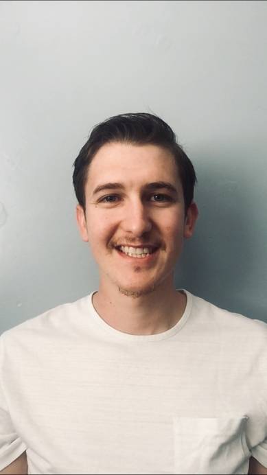 A headshot of a graduate