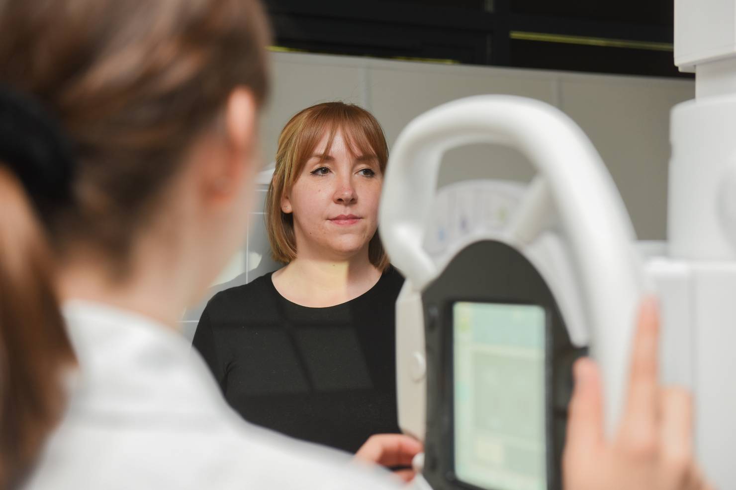 Close-up of a student being x-rayed