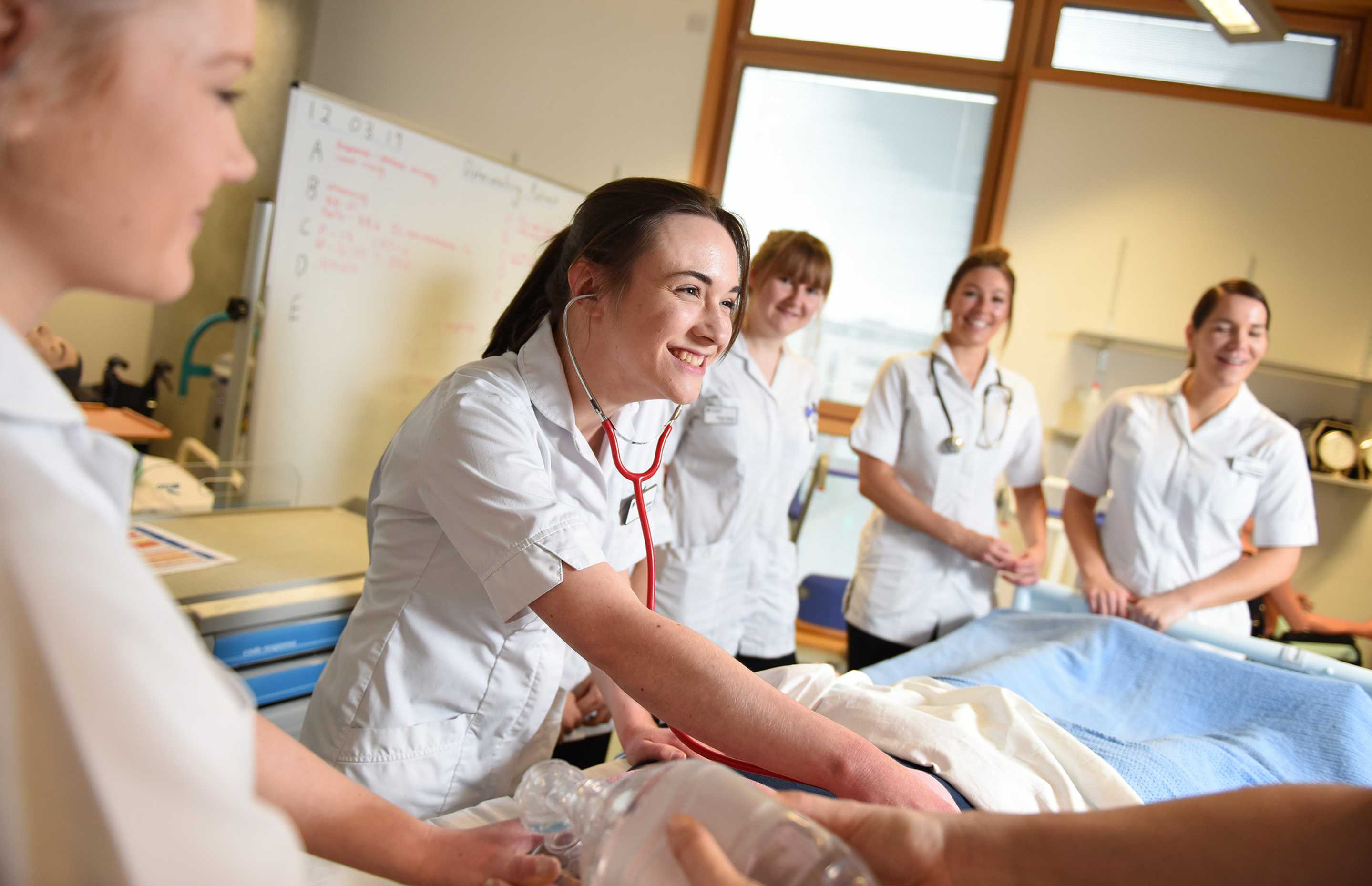 Student using a stethoscope