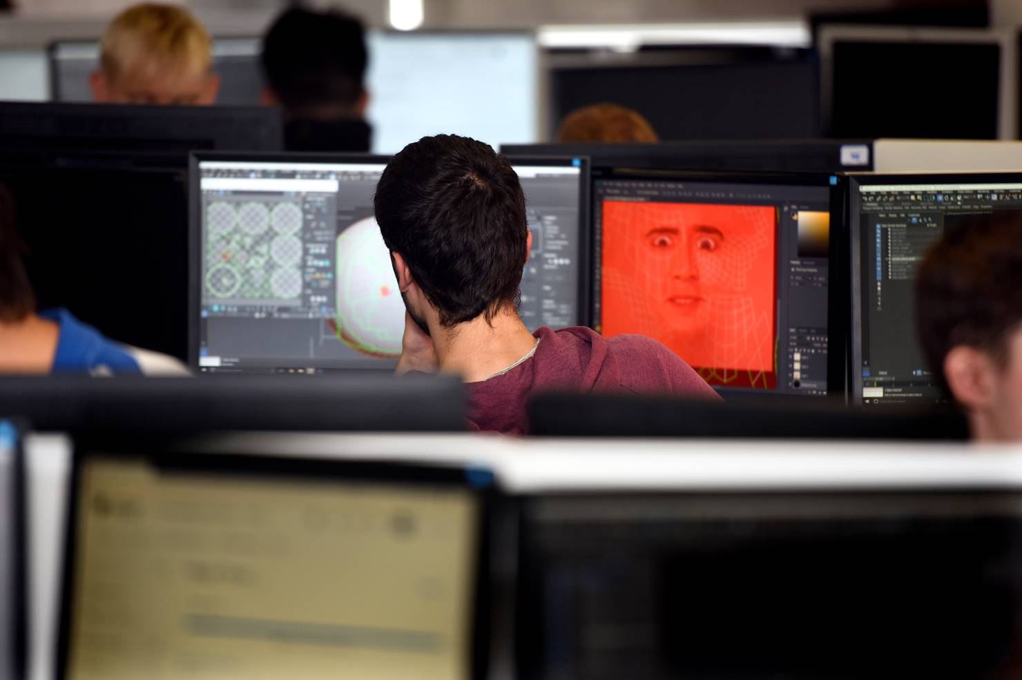 A student sitting at a computer