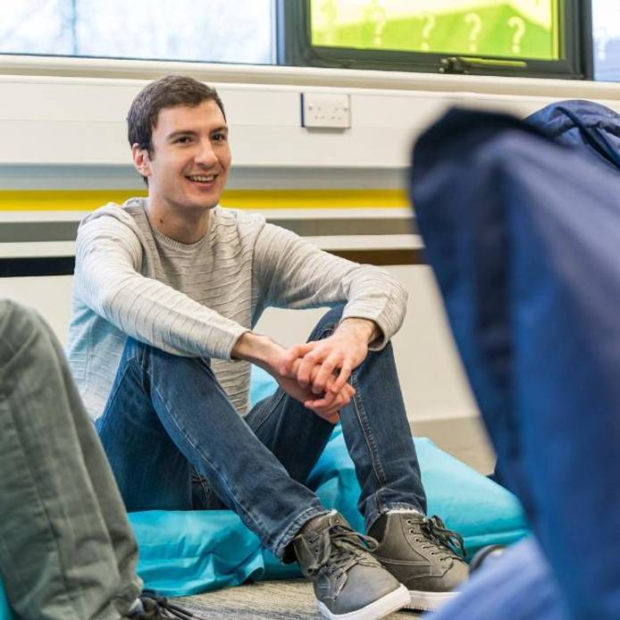 Students on bean bags in the Ideas Room