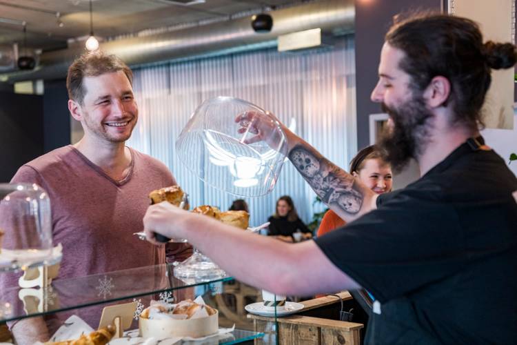 Student being served at a counter
