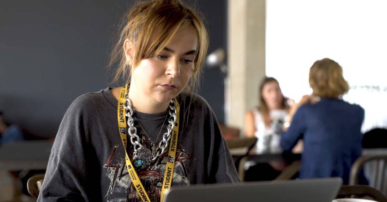 Close-up of student on a laptop