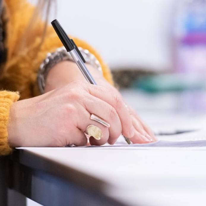 Close-up of a student writing