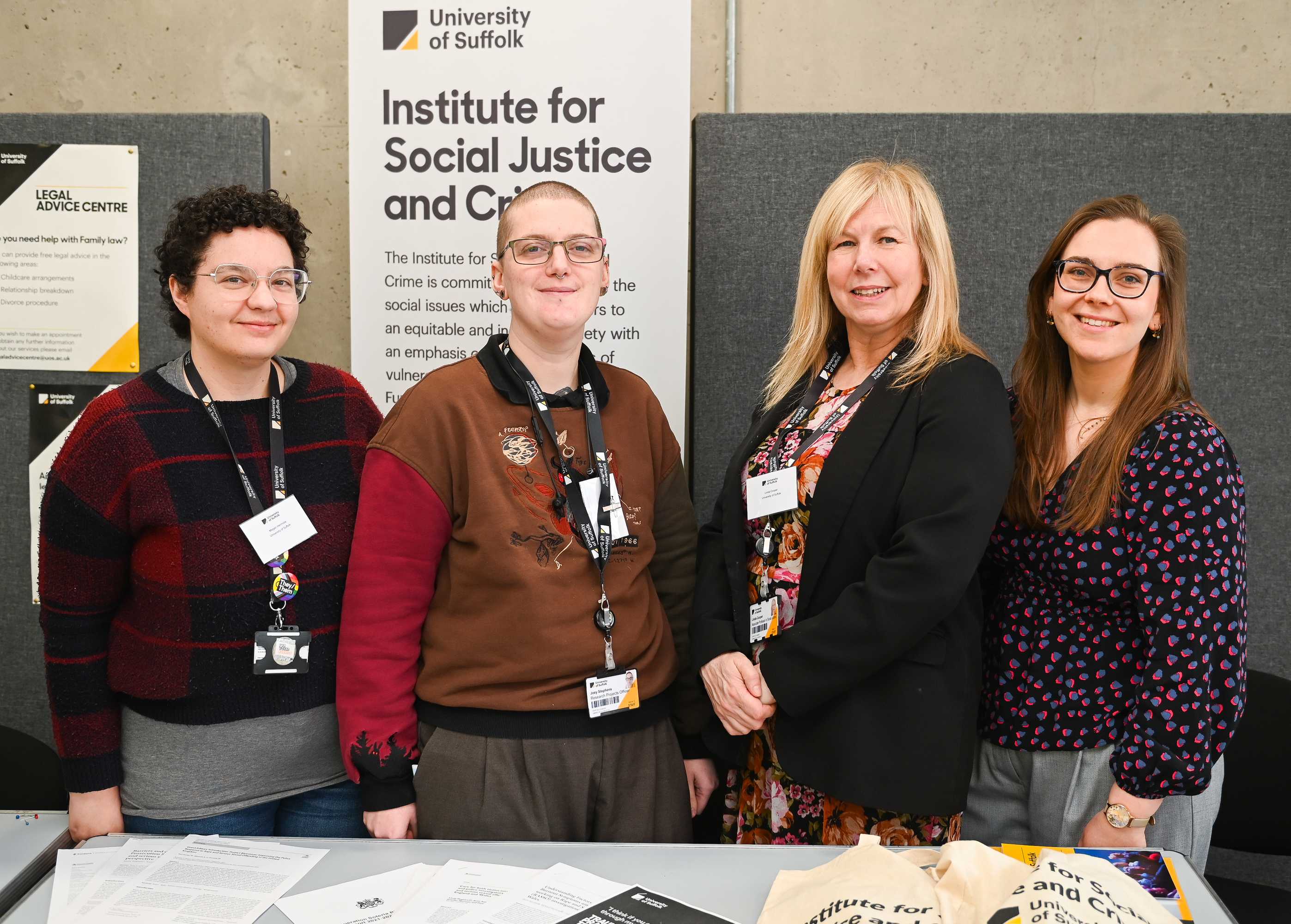 A team photo of four individuals from the Institute of Social Justice and Crime