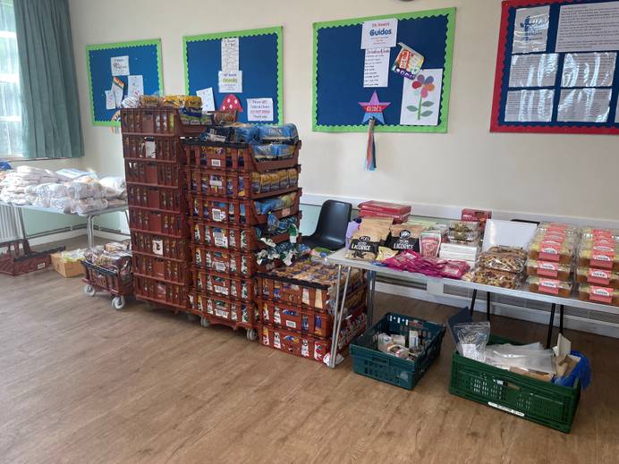 Boxes of food laid out on tables at one of the op Up Shops in Ipswich