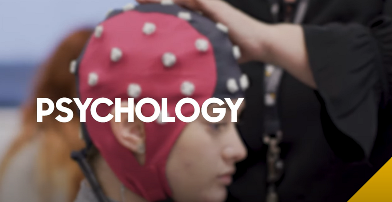 Student and teacher using Psychology equipment